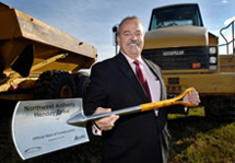Minister of Transportation Luke Ouellette celebrates official start of construction.