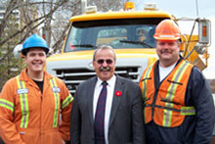 Left to Right: Richard Ireland, TSM; Hon. Luke Ouellette, Minister of Transportation; Ron Johnson, Alberta Highway Services